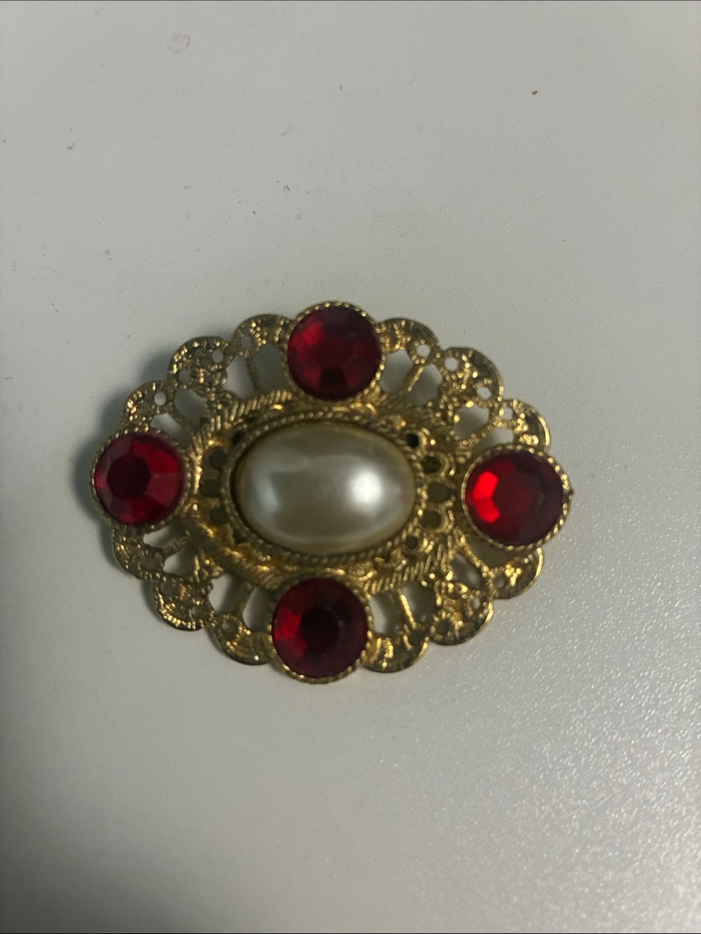 Vintage gold toned pearl pin